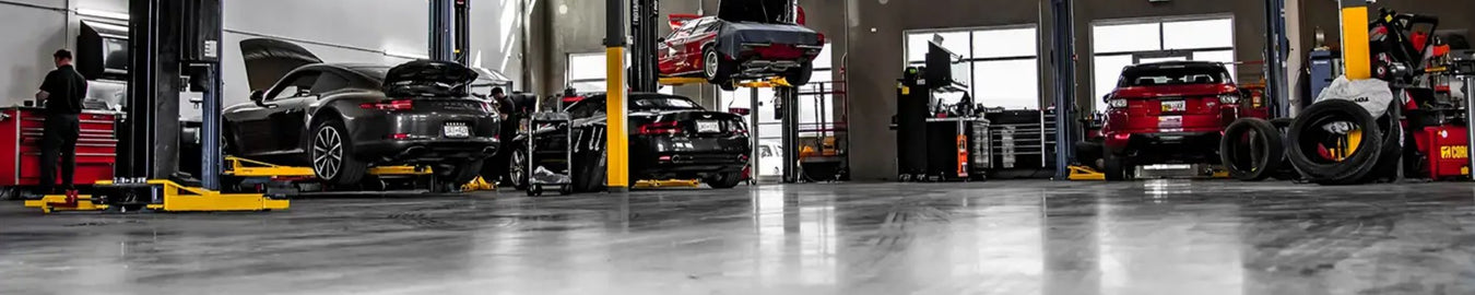 a garage workshop with various car parts